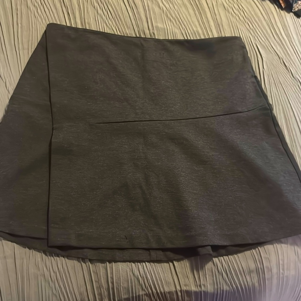 Dark gray crossover, front skirt from Thakoon